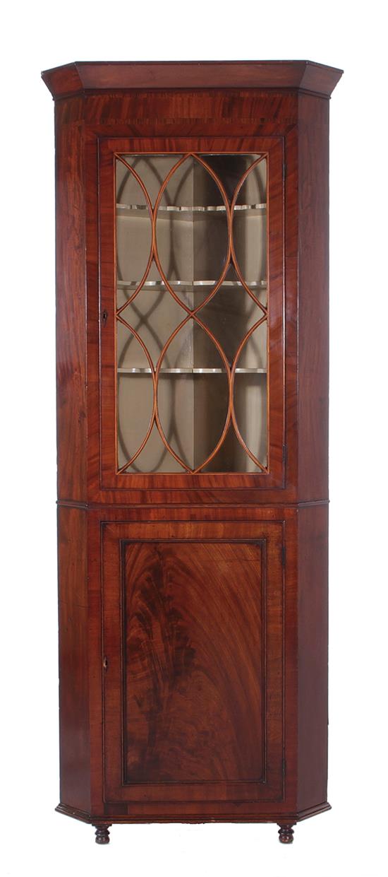 Appraisal: George III mahogany corner cabinet early th century canted crown