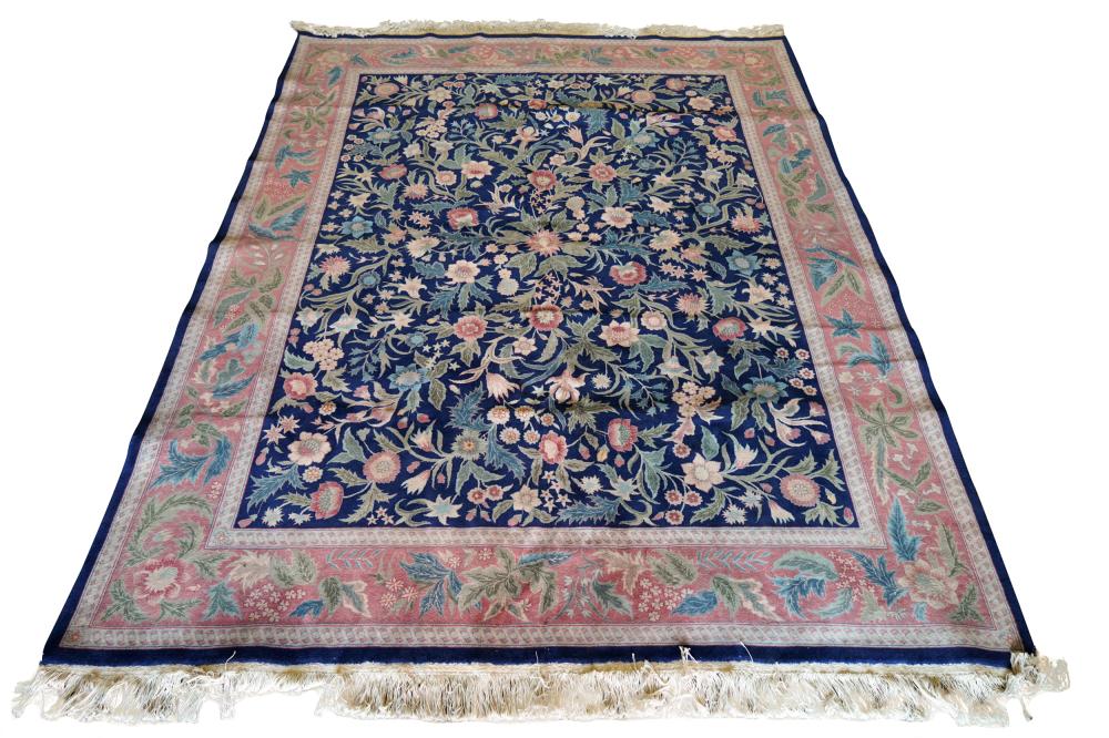 Appraisal: CHINESE BLUE-GROUND AREA RUGwool on cotton foundation with floral design