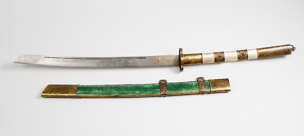 Appraisal: Chinese sword Chinese sword of a honorable person in bowed