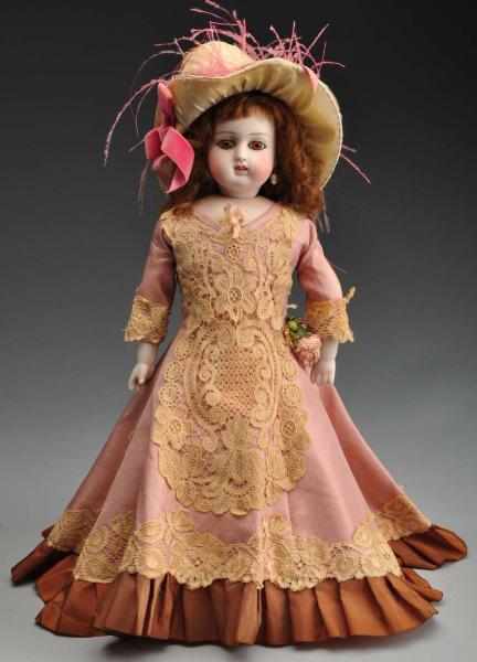 Appraisal: Lady Doll with Closed Mouth Description Unmarked German bisque socket