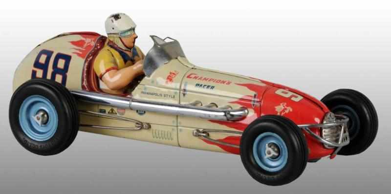 Appraisal: Tin No Champion's Race Car Friction Toy Description Japanese Working