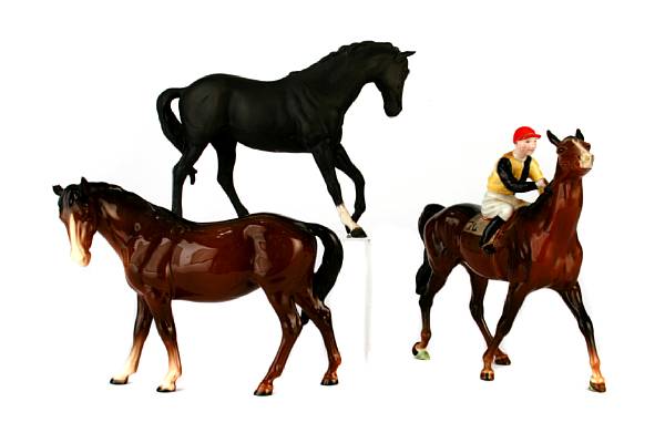 Appraisal: A group of three Beswick pottery models of horses including