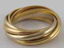 Appraisal: An carat gold multi band ring by Cartier signed and