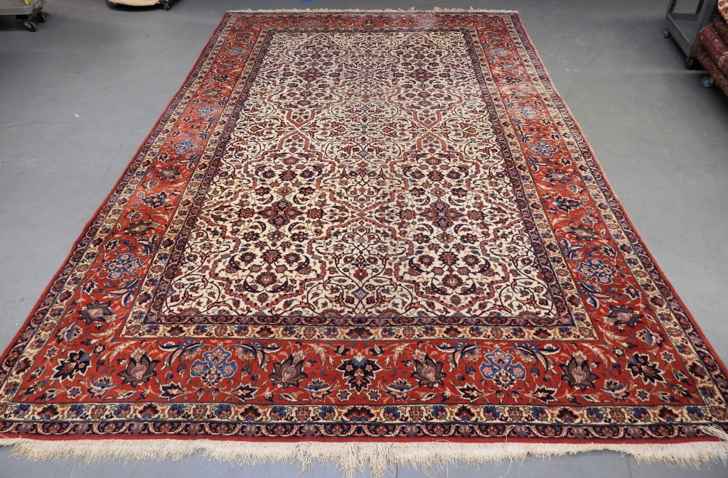 Appraisal: ANTIQUE ISFAHAN RUG Middle EastLate th CenturyNavy blue blue rust