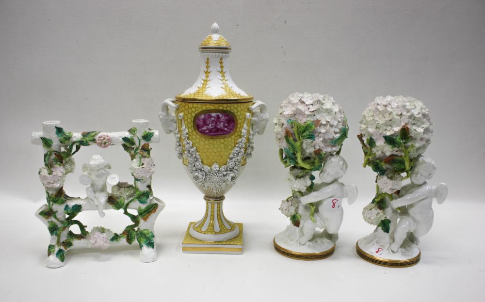 Appraisal: FOUR PORCELAIN FLOWER ENCRUSTED VESSELS comprised of the piece Moore