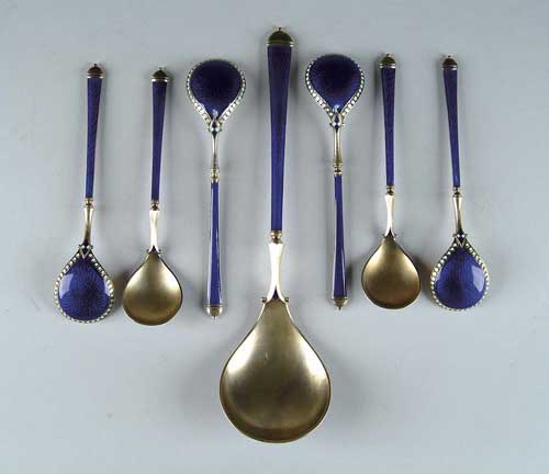 Appraisal: SEVEN PIECE ENAMELED AND STERLING BERRY SPOON SET Scandinavian origin