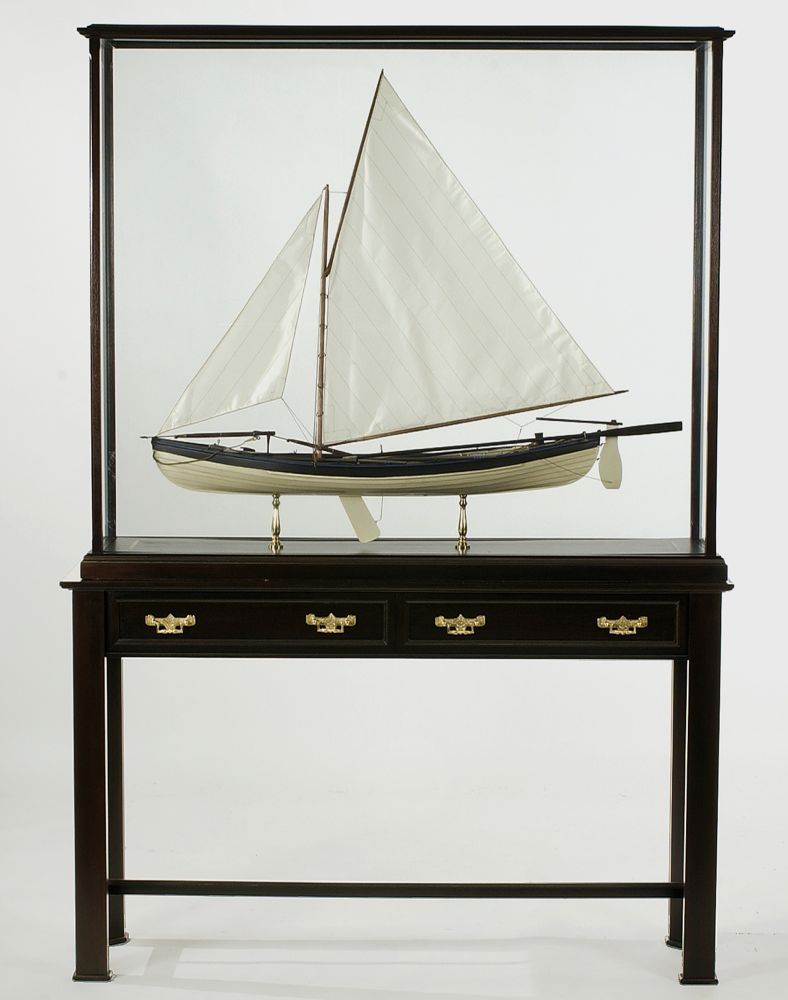 Appraisal: CASED MODEL OF A WHALEBOAT Under sail with all oars