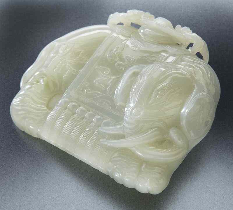 Appraisal: Chinese Qing carved jade belt buckle depicting anelephant ''H x