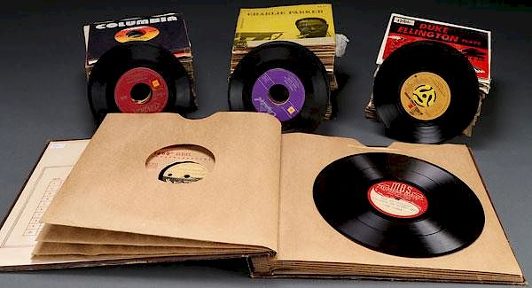 Appraisal: A COLLECTION OF OVER RPM RECORDS A COLLECTION OF OVER