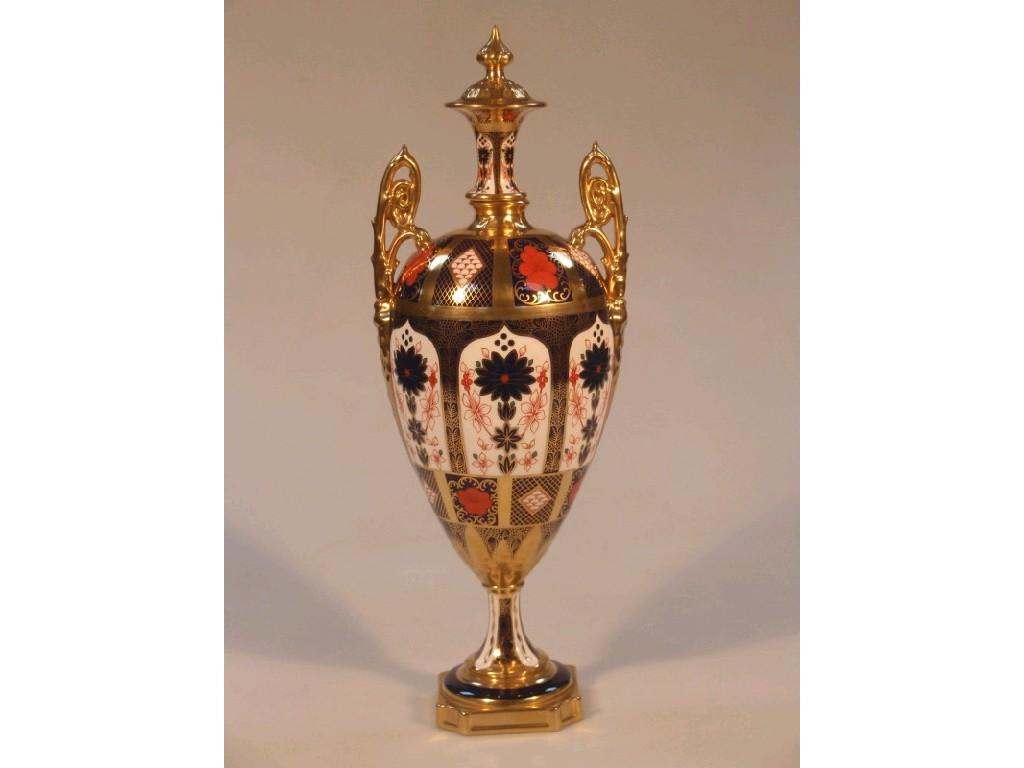 Appraisal: A large modern Royal Crown Derby twin handled urn vase