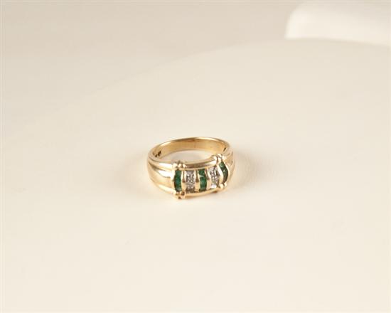 Appraisal: A Gold Diamond and Emerald Ring K marked yellow gold