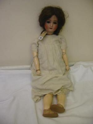 Appraisal: An Alt Beck Gottschalck bisque headed doll with blue lashed