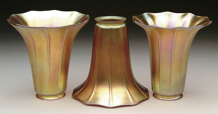 Appraisal: SET OF THREE STEUBEN SHADES Three gold Steuben aurene shades