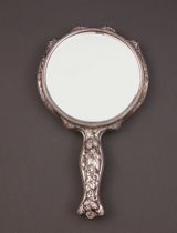 Appraisal: A Victorian Silver Repousse Hand Mirror ca Late th Century