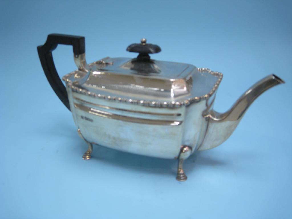 Appraisal: A George V Teapot with gadrooned rim on hoof feet