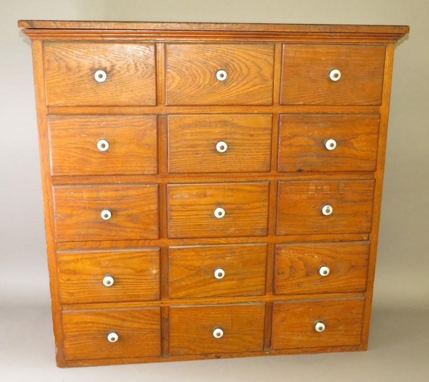 Appraisal: OAK DRAWER STORE CABINETca - storage cabinet with oak paneled