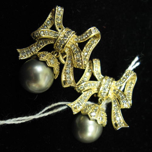 Appraisal: PAIR OF SOUTH SEA PEARL DIAMOND AND FOURTEEN KARAT GOLD