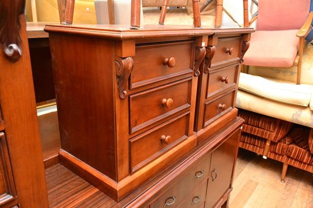 Appraisal: A PAIR OF ANTIQUE STYLE THREE DRAWER BED SIDE CABINETS