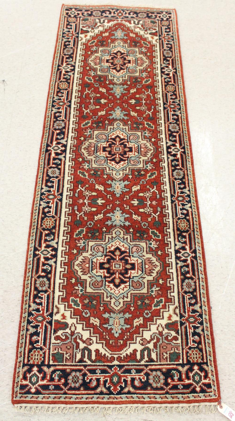 Appraisal: TWO SIMILAR HAND KNOTTED ORIENTAL HALL RUGS Persian Serab design