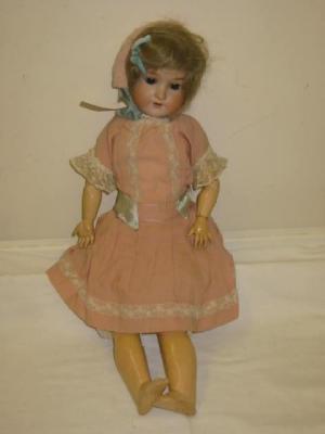 Appraisal: An Armand Marseille bisque head doll with brown sleeping eyes