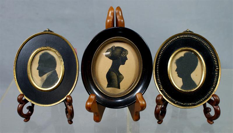 Appraisal: oval handcut silhouettes women and a man in period frames