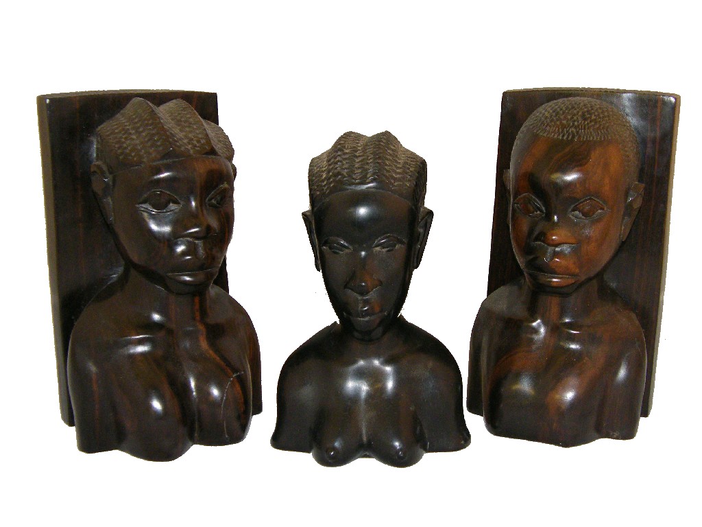 Appraisal: African carved bookends modelled as a stylised lady and gentleman