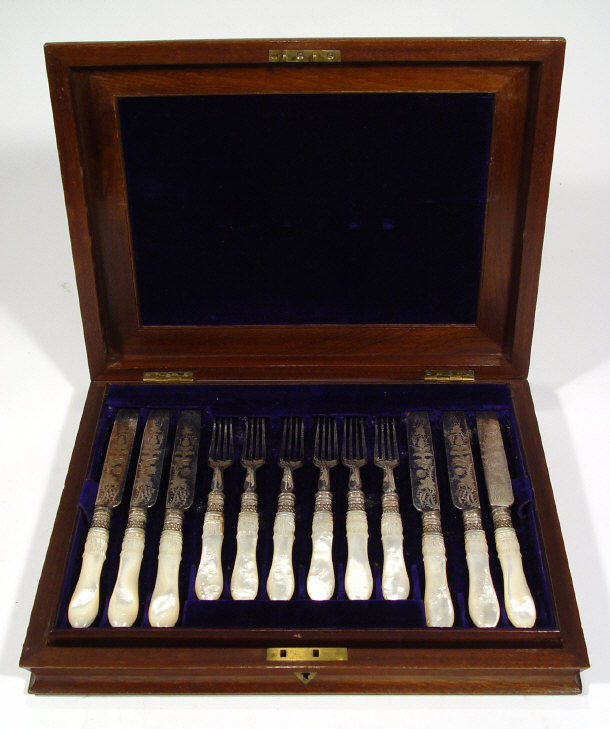 Appraisal: Set of twelve silver plated knives and forks with faux