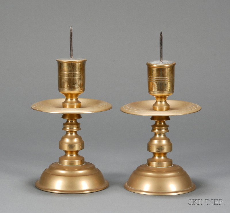 Appraisal: Pair of Brass Candlesticks Northern Europe th century turned stem