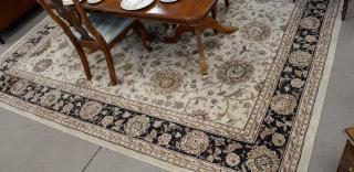 Appraisal: Oriental room size carpet tan ground with black and red