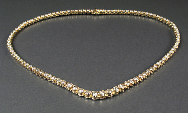 Appraisal: DIAMOND AND FOURTEEN KARAT GOLD NECKLACE WITH APPRAISAL set with