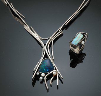 Appraisal: A sterling silver and opal necklace and ring suite by