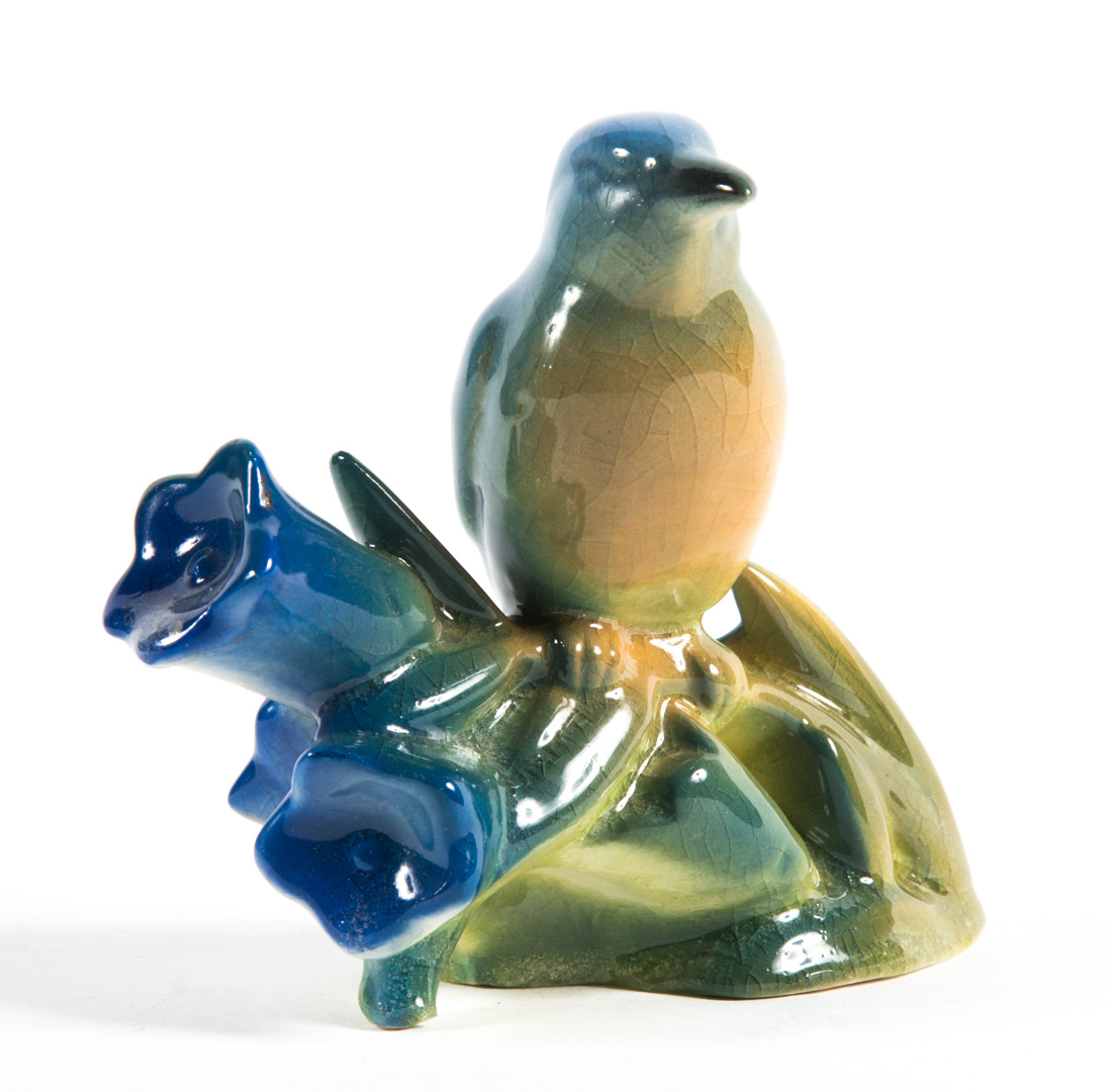 Appraisal: Rookwood pottery bird and flower figure dated impressed marks and