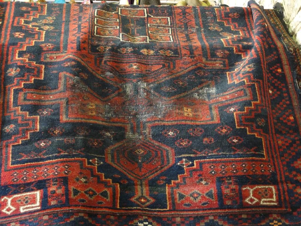 Appraisal: Two antique carpets of Middle Eastern design with wear and