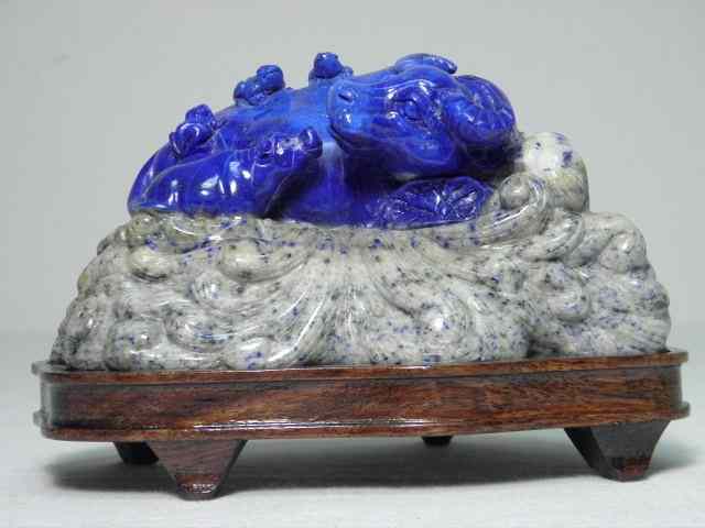 Appraisal: Carved blue lapis sculpture depicting a bull with calf Lapis