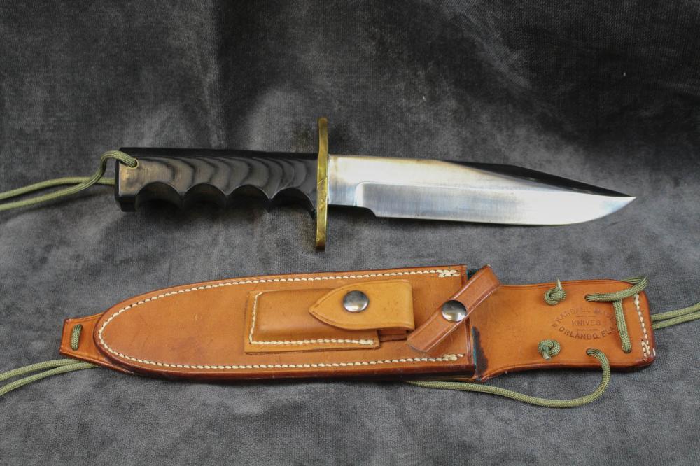 Appraisal: VINTAGE RANDALL MADE MODEL ATTACK KNIFE having blade double sided