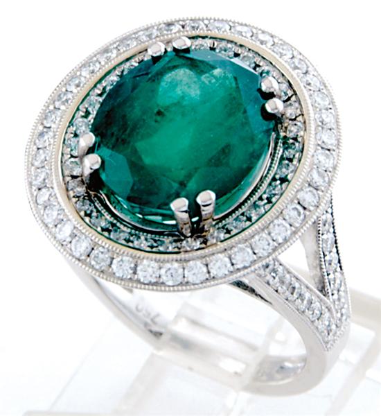 Appraisal: Colombian emerald and diamond ring oval emerald ct and ninety-eight