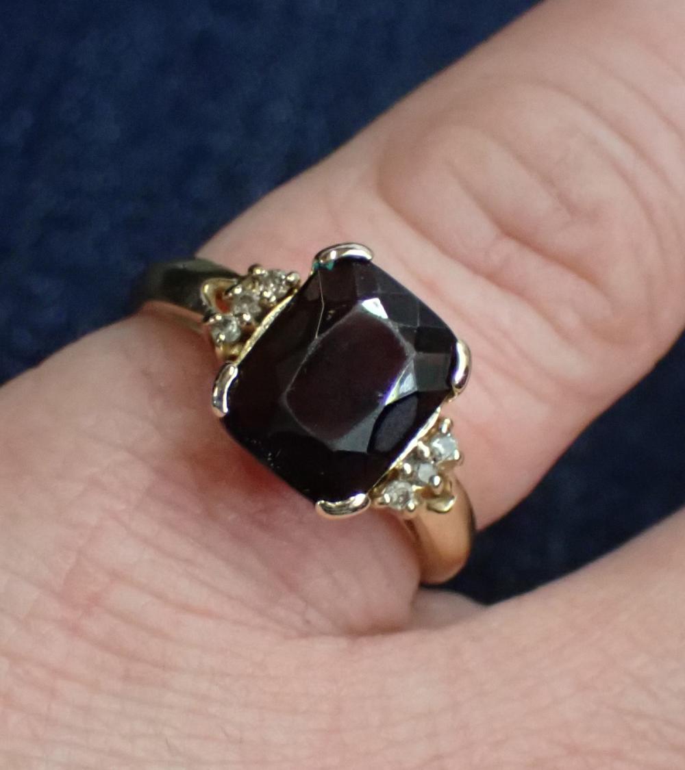 Appraisal: GARNET DIAMOND AND FOURTEEN KARAT GOLD RING with three round-cut