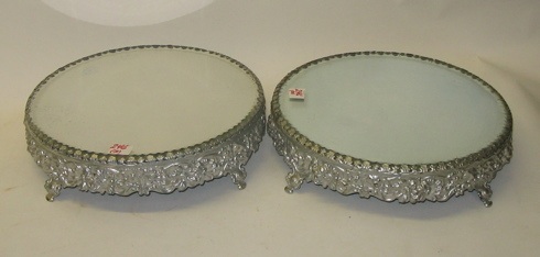 Appraisal: PAIR BEVELED MIRROR PLATEAUS having floral decorated sides and raised