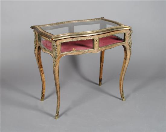 Appraisal: A Louis XV Style Gilt Metal Mounted Vitrine Table Height