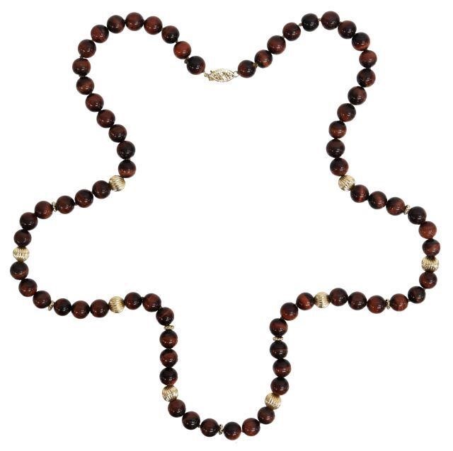 Appraisal: Estate beaded necklace seventy-two tiger's eye beads individually knotted on