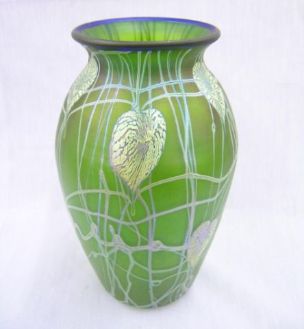 Appraisal: Green satin finish art glass vase with iridescent leaf and