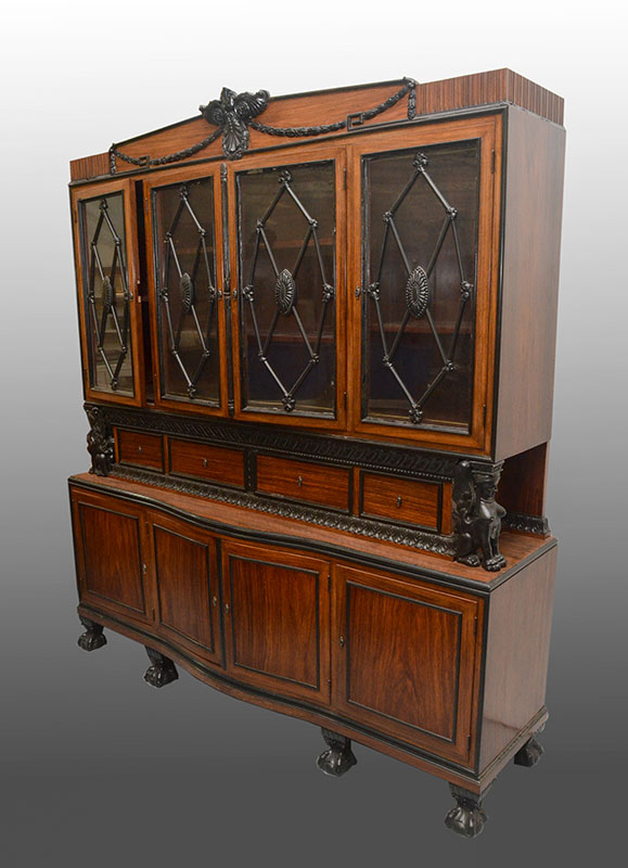 Appraisal: ORNATE ROSEWOOD CONTINENTAL BREAKFRONT CABINET Rosewood veneer all over crest