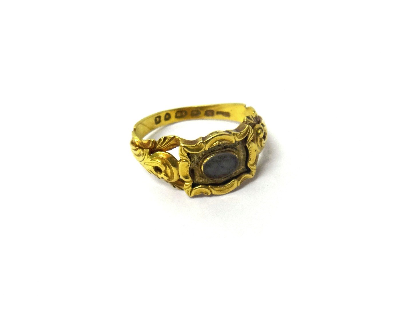 Appraisal: A Victorian ct gold mourning ring the centre mounted with