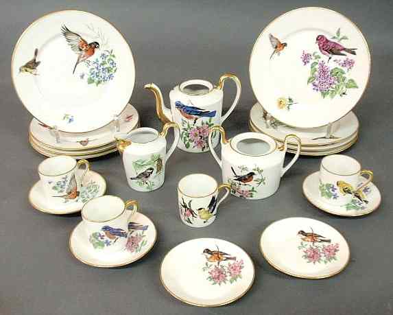 Appraisal: Partial Limoges dessert service with colorful bird floral and gilt