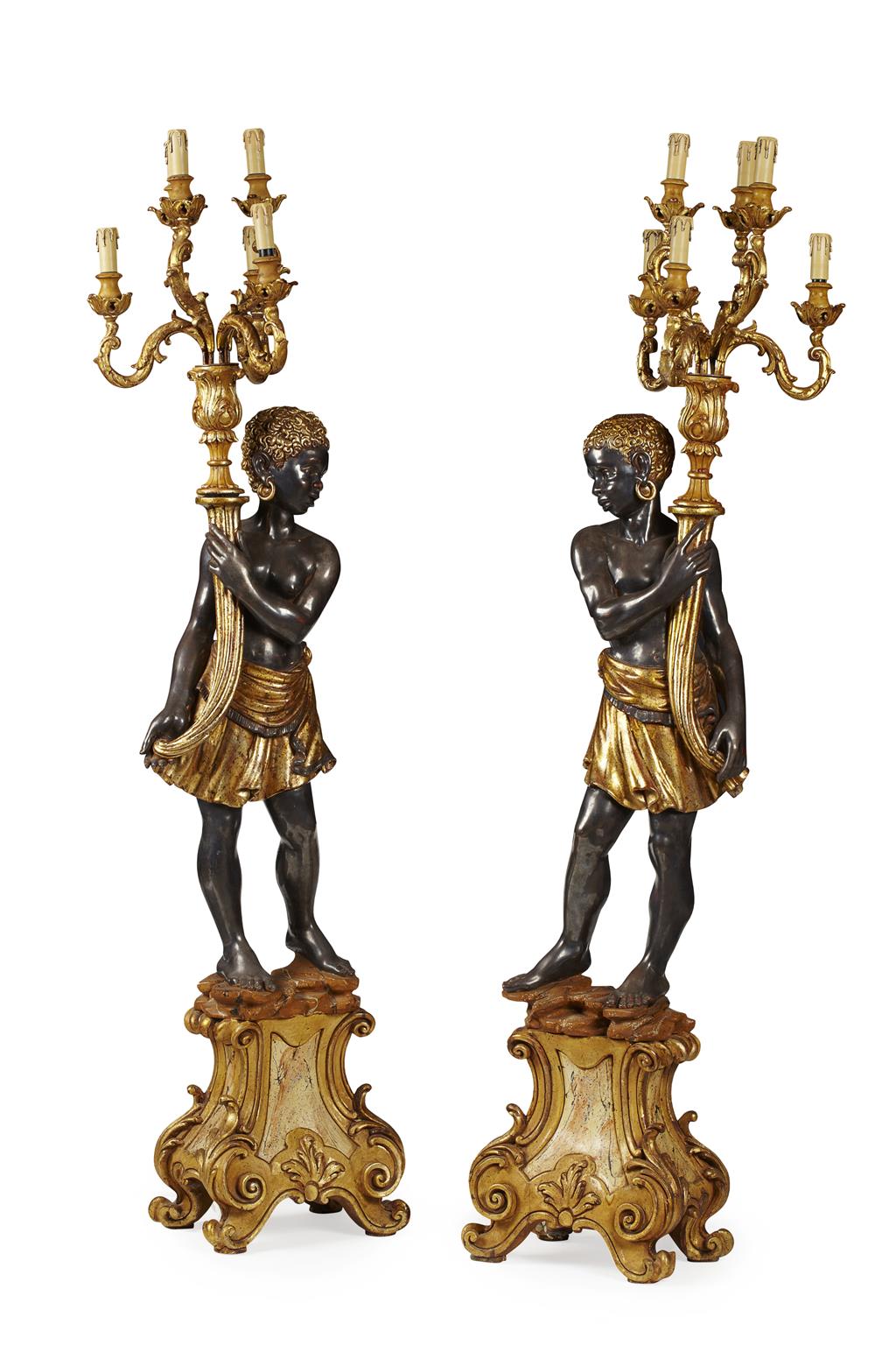 Appraisal: PAIR OF VENETIAN CARVED GESSO AND PARCEL GILT BLACKAMOOR TORCHERES