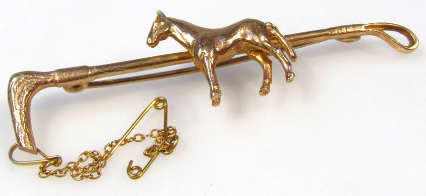 Appraisal: A ct gold tie pin brooch formed as a whip