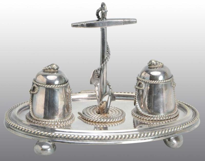 Appraisal: Silver Plated th Century English Inkstand Description Oval base with