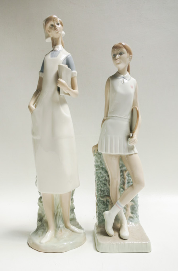 Appraisal: TWO LLADRO PORCELAIN FIGURINES Nurse sculptor Salvador Furio issued together