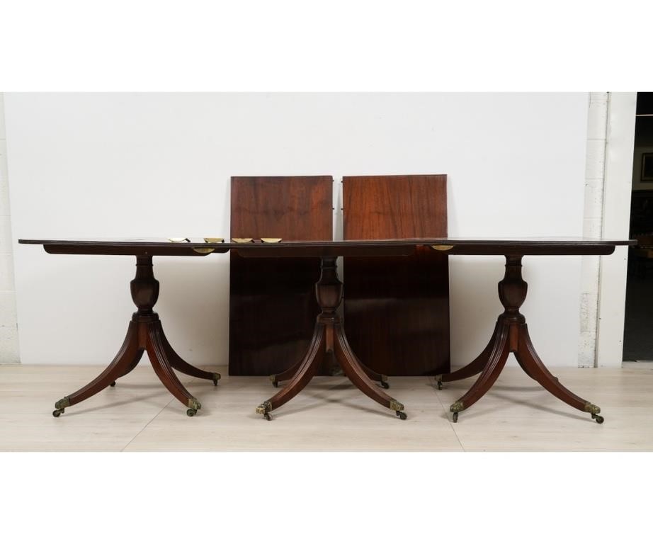 Appraisal: Georgian style triple pedestal mahogany banquet table severe crack to