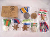 Appraisal: A group of eight WW I and II medals including